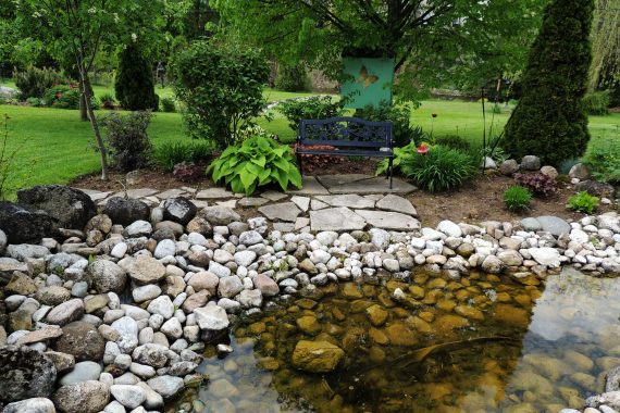 10 Awesome River Rock Landscaping Ideas | Wilson Blacktop