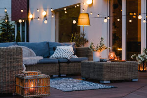 Patio furniture with the glow of outdoor string lights