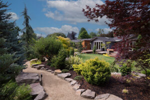 Pebble pathway thru a manicured landscape